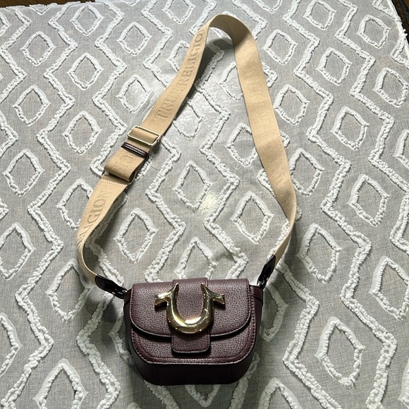 True Religion Handbags - True Religion cross body bag. B22
